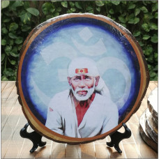 Tree Slice With Sai Baba Picture