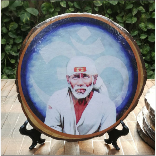 Tree Slice With Sai Baba Picture