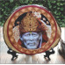 Tree Slice With Sai Baba Picture